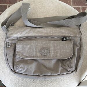 Kipling Gray/Taupe “Syro” Crossbody Bag with Front Flap
